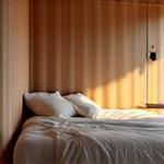 Bedroom with circadian rhythm lighting subtly changing color